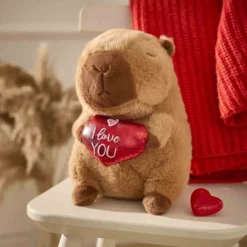 Kuscheltier Capybara mit Herz, 22 cm